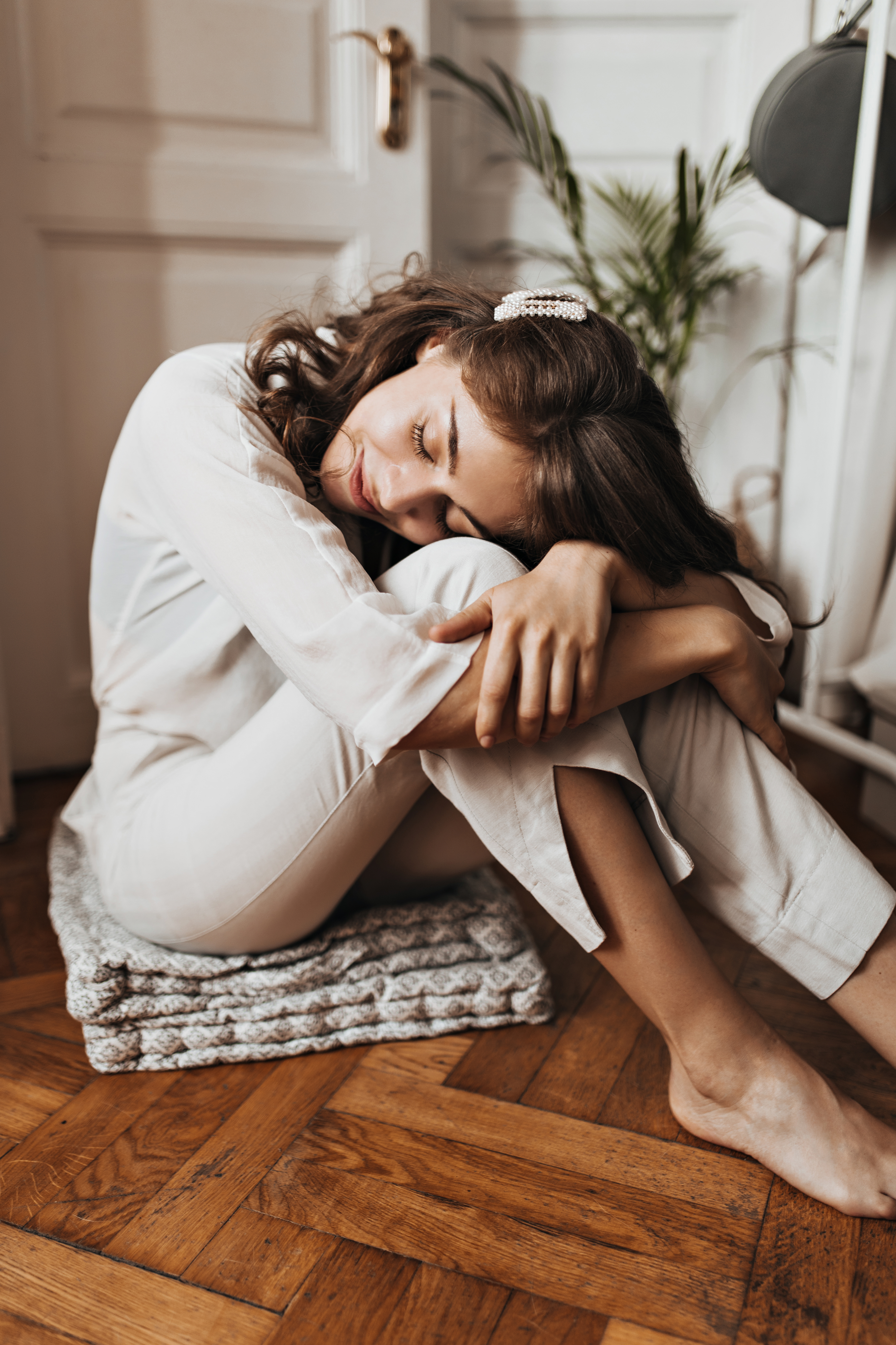 Woman resting peacefully on the floor